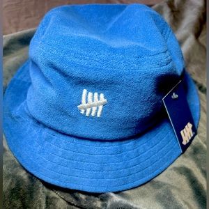 Undefeated blue terry cloth bucket hat. NWT